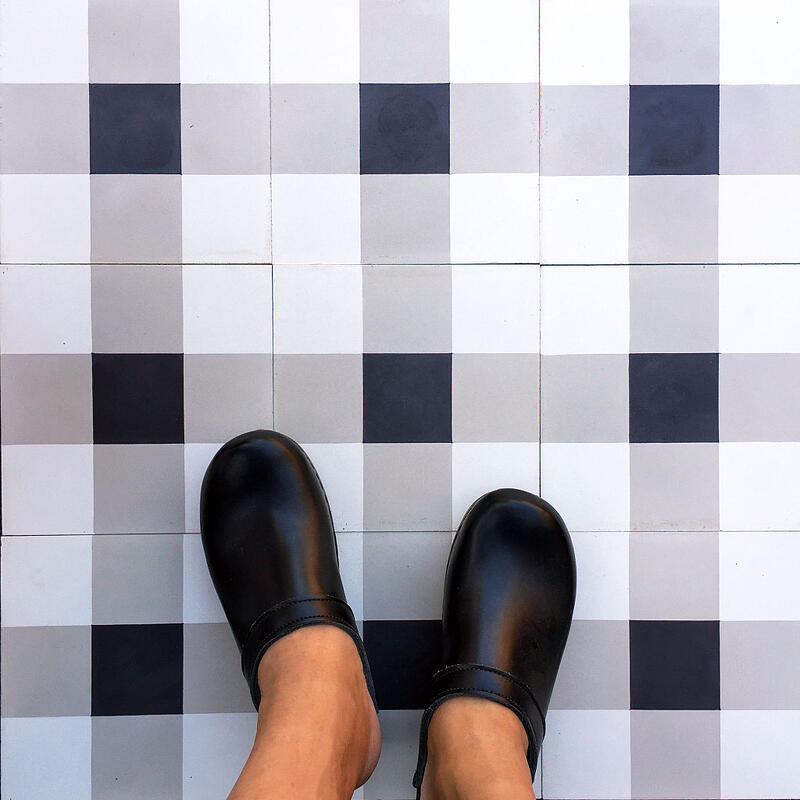 cement tile in checkmate makes plain jane magical