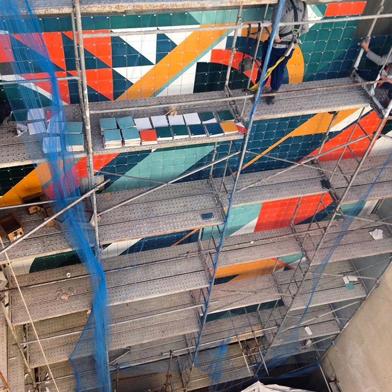 brazilian street artist coletivo muda ceramic tile installation 
